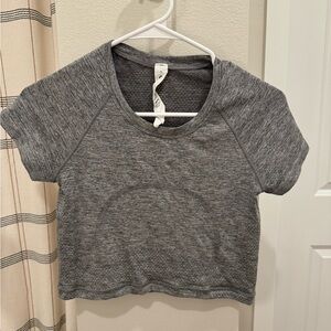 Lululemon size 4 heathered grey cropped swiftly